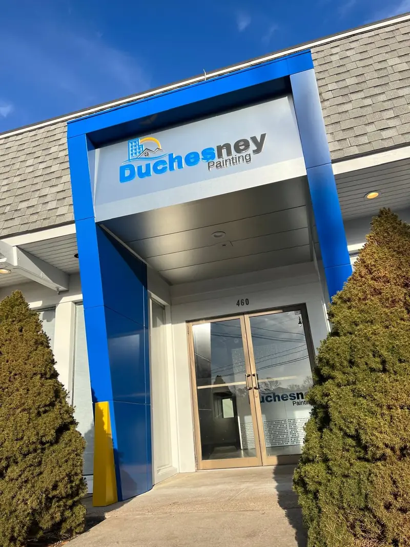 Front view of the blue ACM entrance with signage, Hyannis